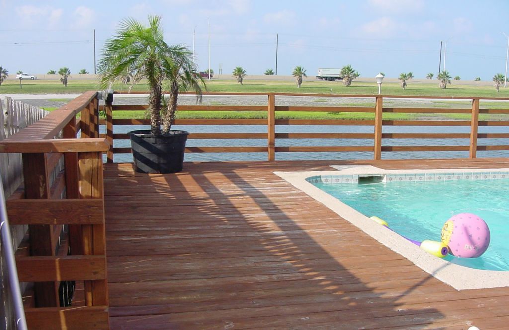 EXISTING WOOD DECK, CONCRETE STEPS and FLATWORK, HANDRAILS, BULKHEAD, STAIRS and POOL to be REPLACED